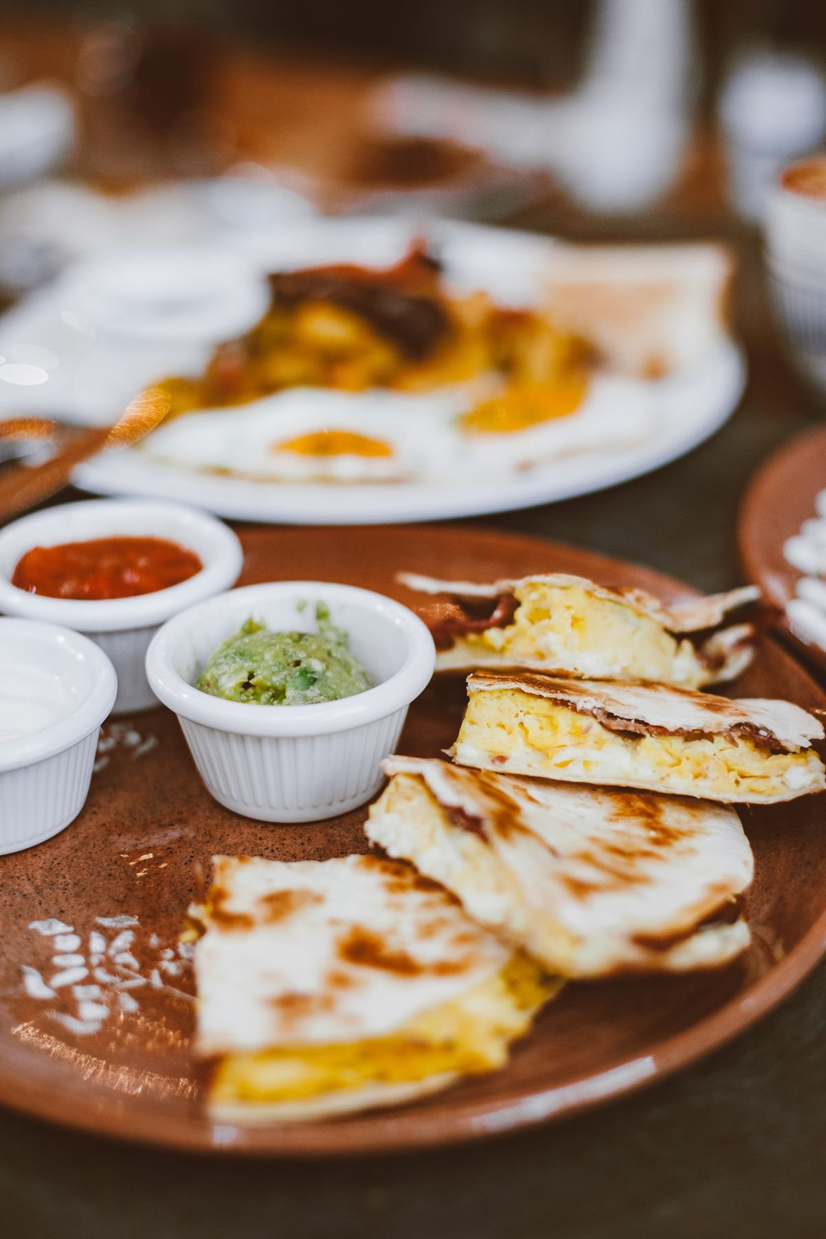Quesadilla wedges served with salsa and guacamole