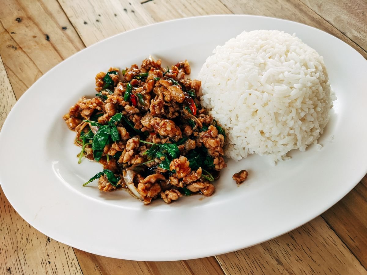 Thai basil stir-fry served with a mound of white rice